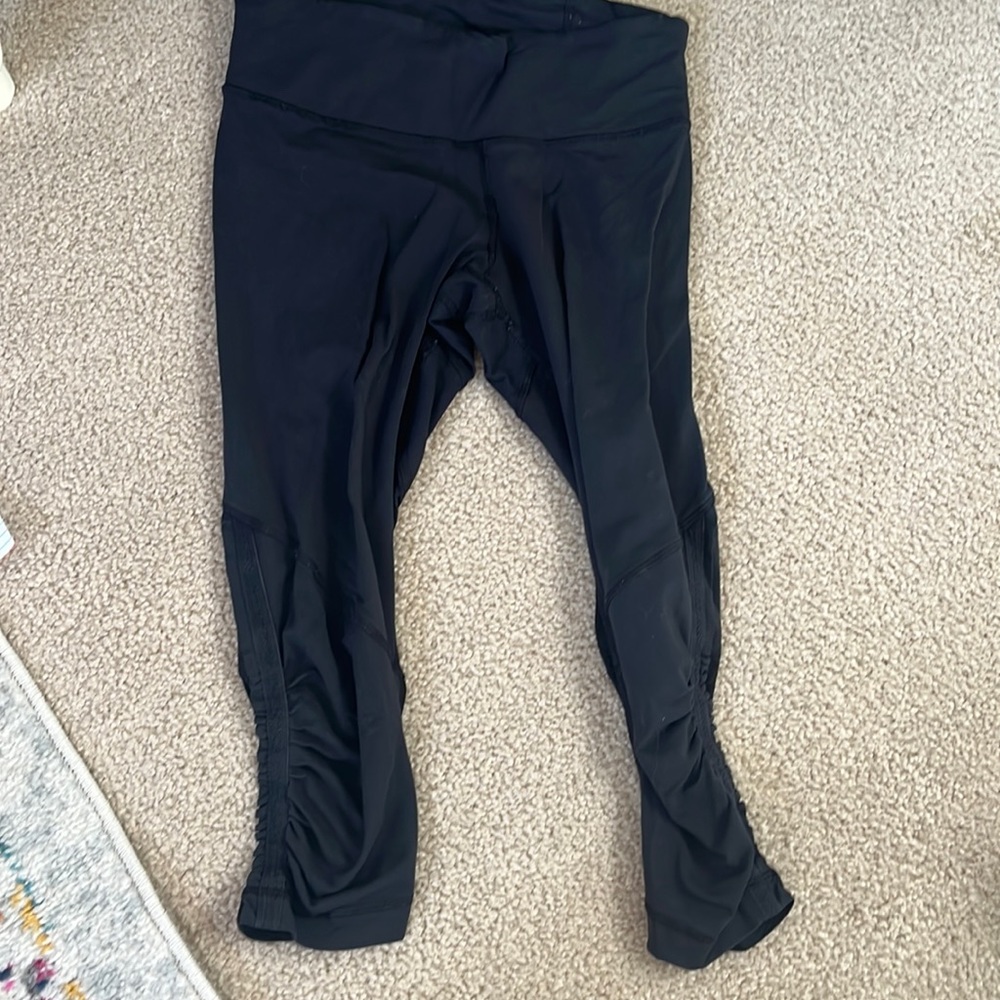 Black cropped lululemon leggings, size 4 with ruching at bottom